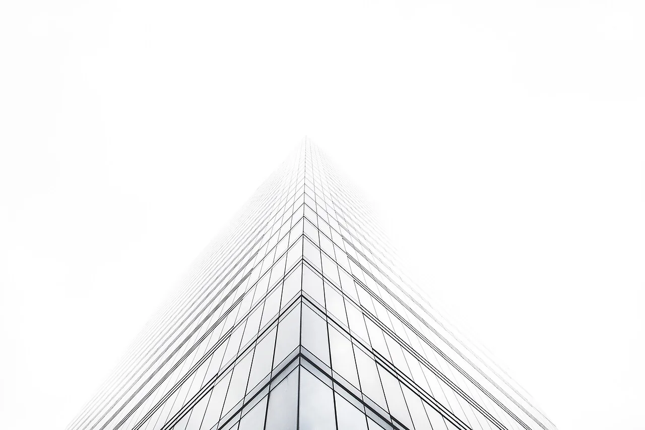 Office building in mist (Unsplash)
