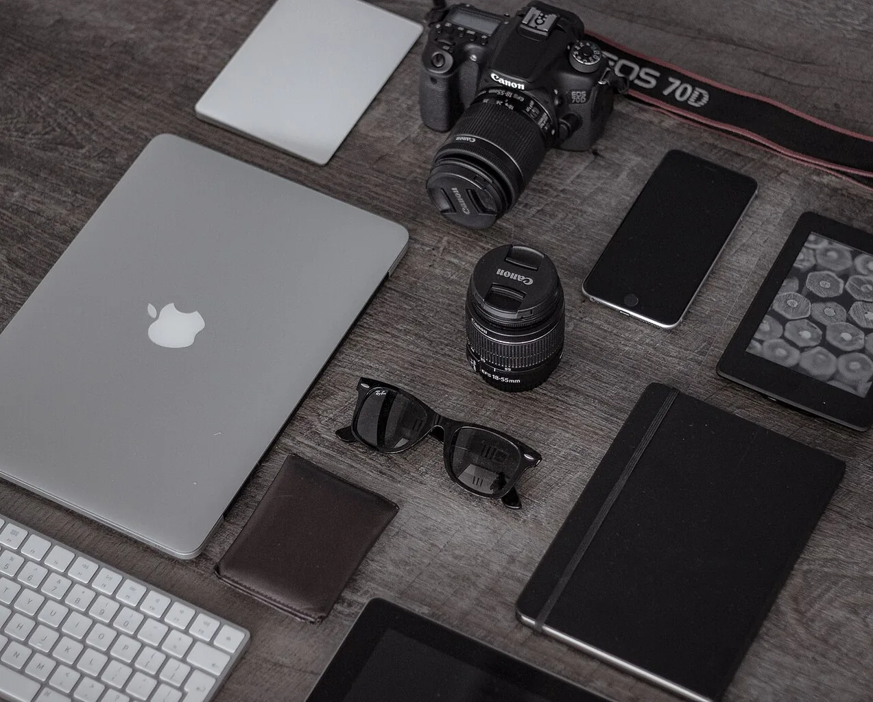 Laptop camera phone notebook (Unsplash)